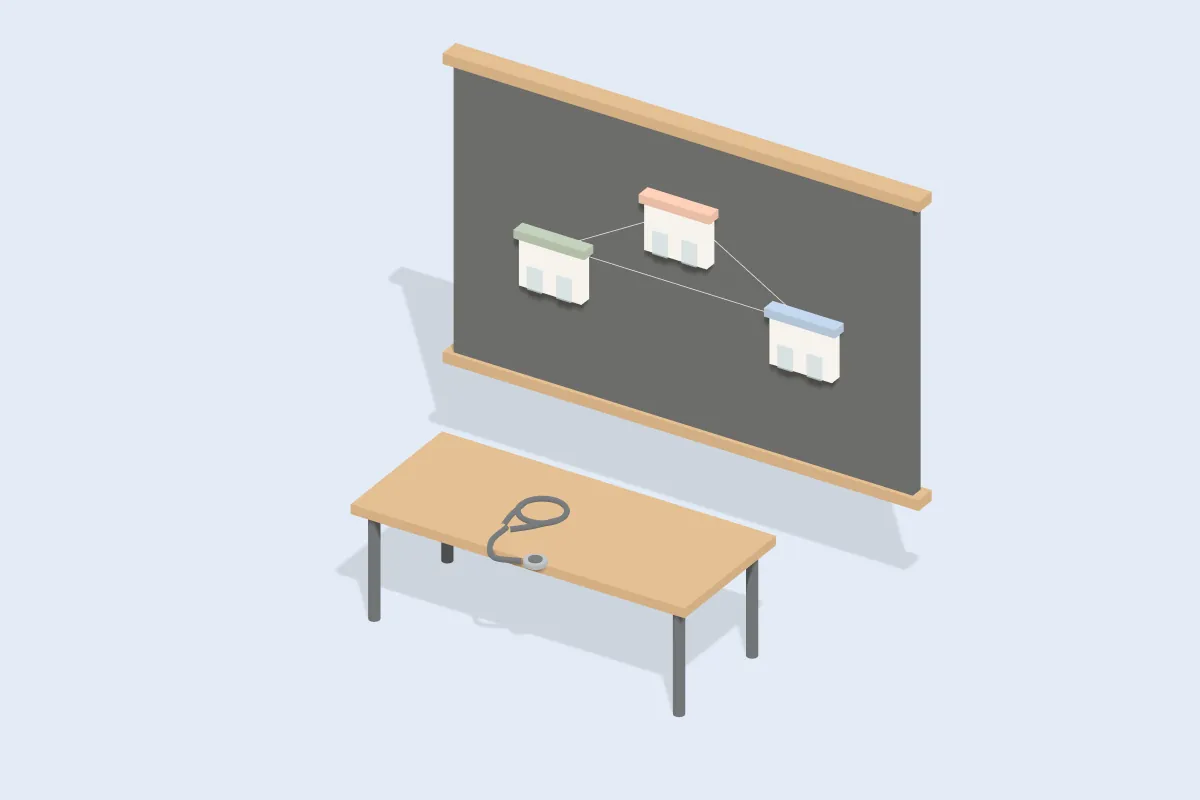 Wandtafel mit drei Praxisgebäuden und Verbindungslinien, davor ein Stethoskop auf einem Tisch