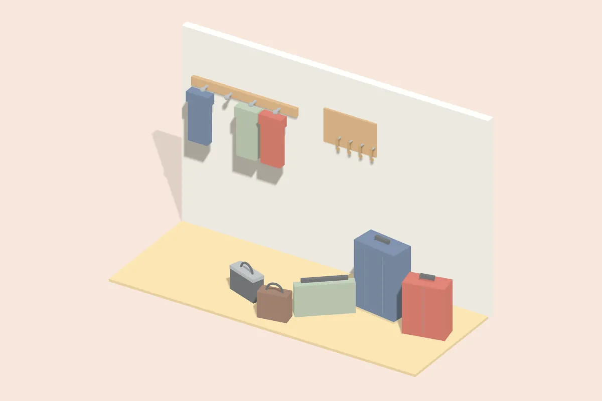 Mehrere Koffer und Taschen im Flur, daneben eine Garderobe mit Jacken und ein Schlüsselbrett