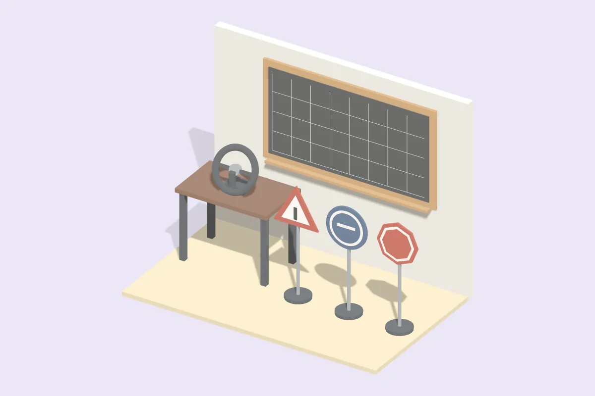 Klassenraum mit Wandtafel, einem Tisch mit Lenkrad und drei Verkehrsschildmodellen