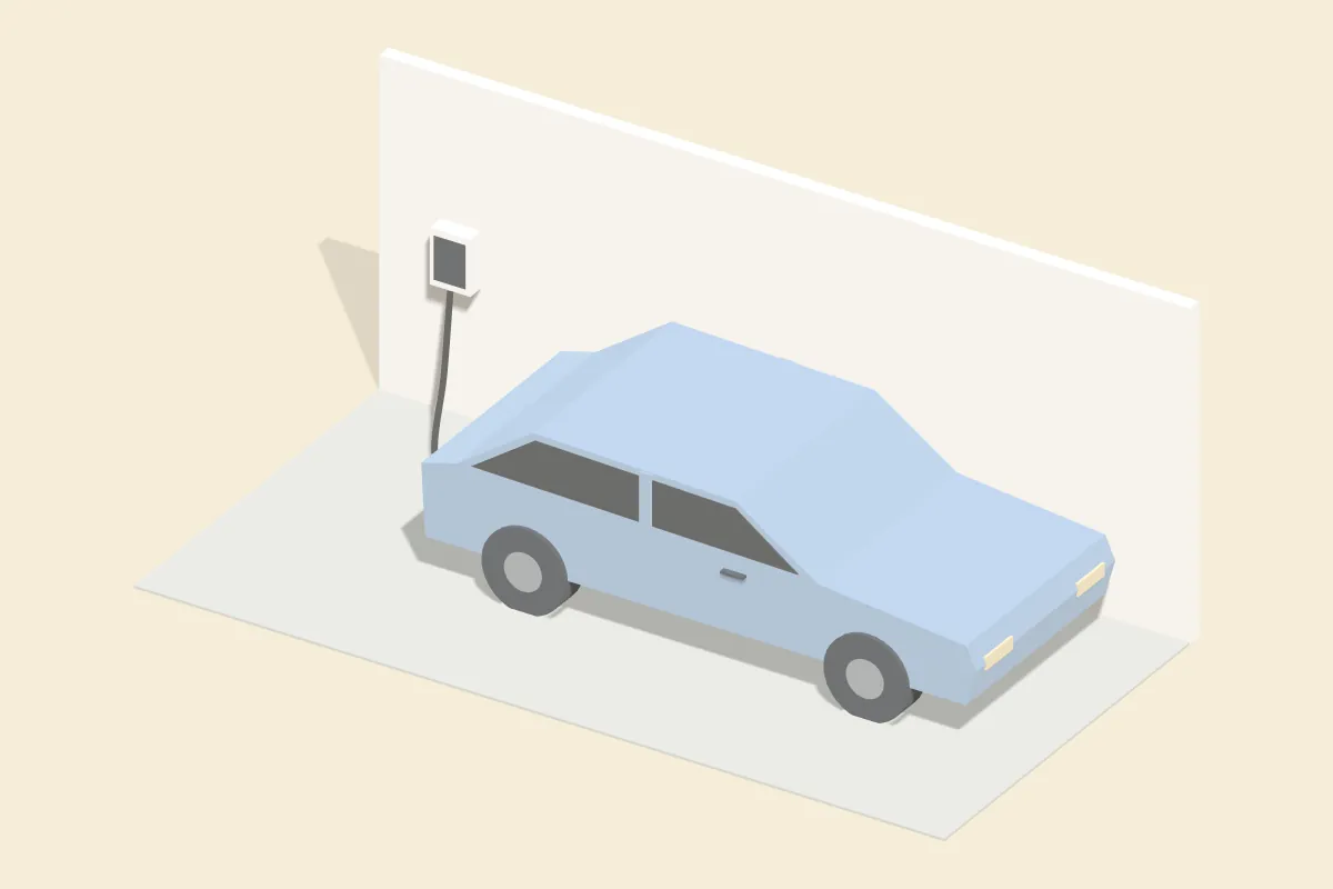 Auto längs vor einer Hauswand geparkt, das Ladekabel führt von der Wallbox zur Ladeklappe
